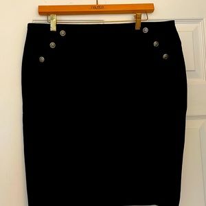 White house black midi skirt with 3 silver buttons on each side.